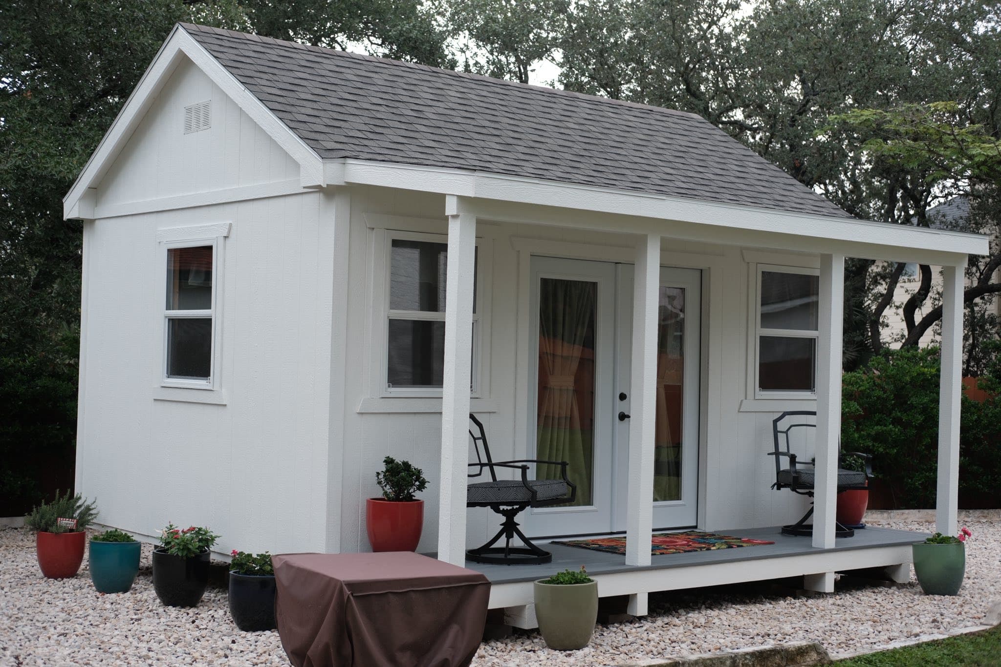 Custom kids playhouse with patio - white wooden outdoor structure